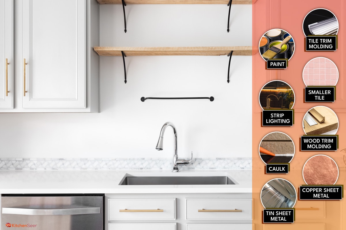 A modern farmhouse kitchen detail shot with grey cabinets, marble countertop and tiled backsplash, gold hardware, and wooden shelves., Backsplash Does Not Reach Cabinets: What To Do?