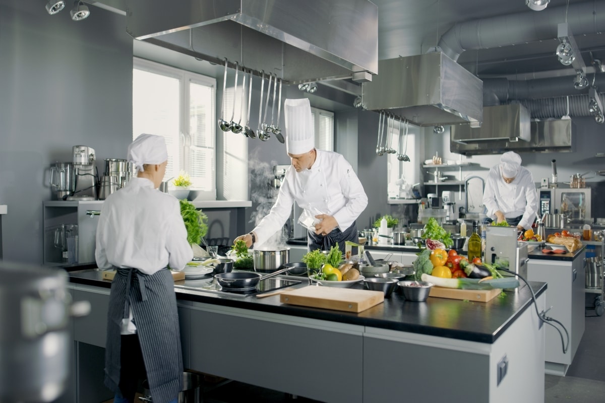Big and Glamorous Restaurant Busy Kitchen, Chefs and Cooks Working on their Dishes., The Biggest Kitchen in the World