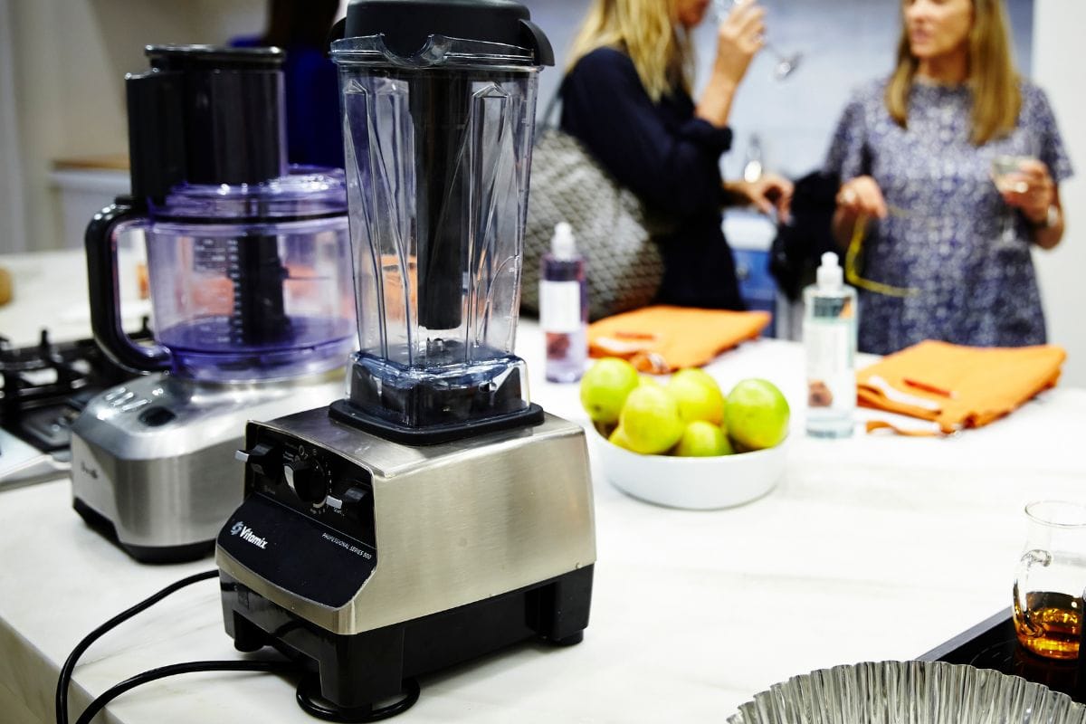 Lifestyle photography of a cooking class taking place at Williams Sonoma cooking school Sydney Australia with a Vitamix and Breville food processor off to the side