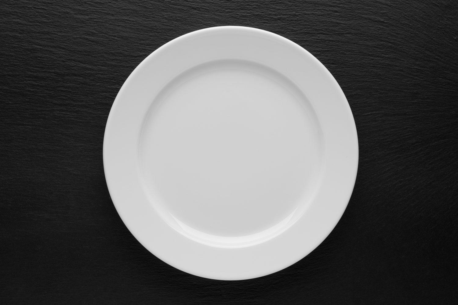 White plates on a black background