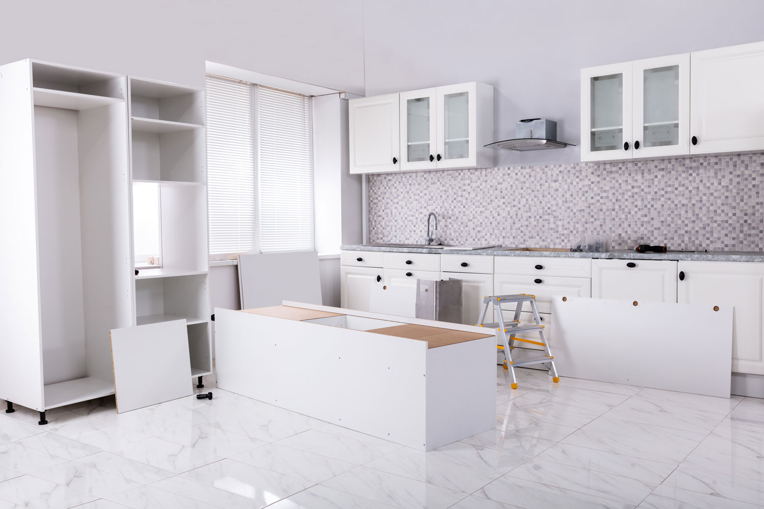 White themed kitchen undergoing construction