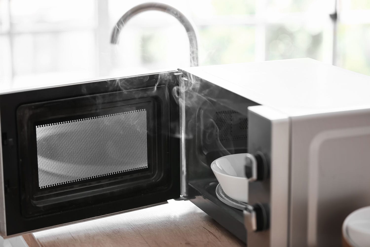 Broken or smoking microwave oven