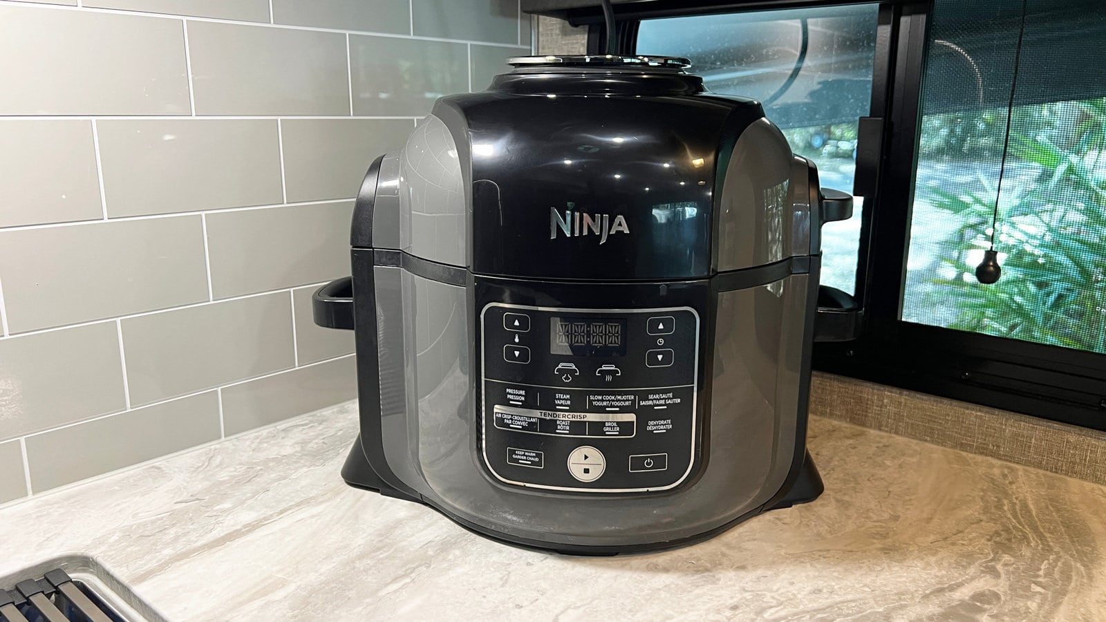 A Ninja Foodi pressure cooker and air fryer is a much used appliance in an RV camper