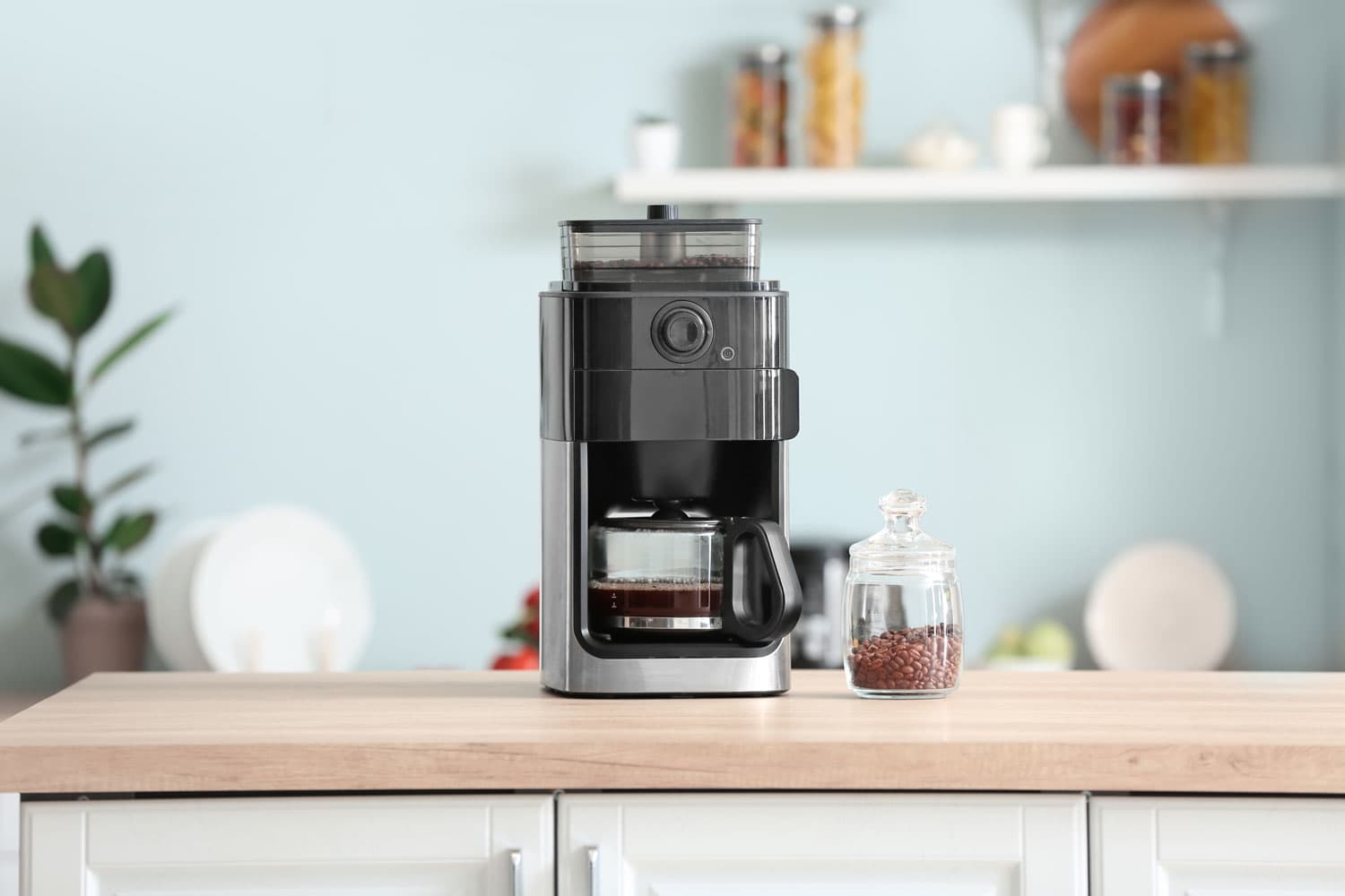 A coffee maker in the kitchen