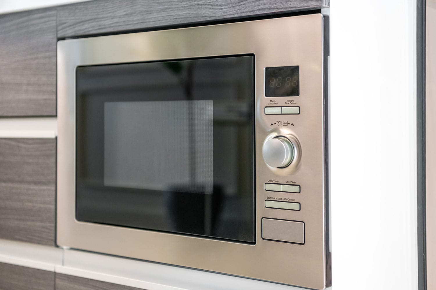 A stainless microwave in the kitchen