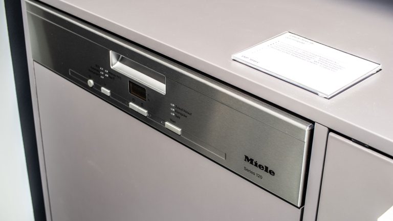 A brand new Miele dishwasher, How To Reset A Miele Dishwasher [Quickly & Easily] - 1600x900