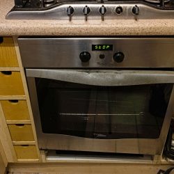 A Whirlpool oven in the kitchen, How To Remove A Whirlpool Oven Door [Step-By-Step Guide] - 1600x900