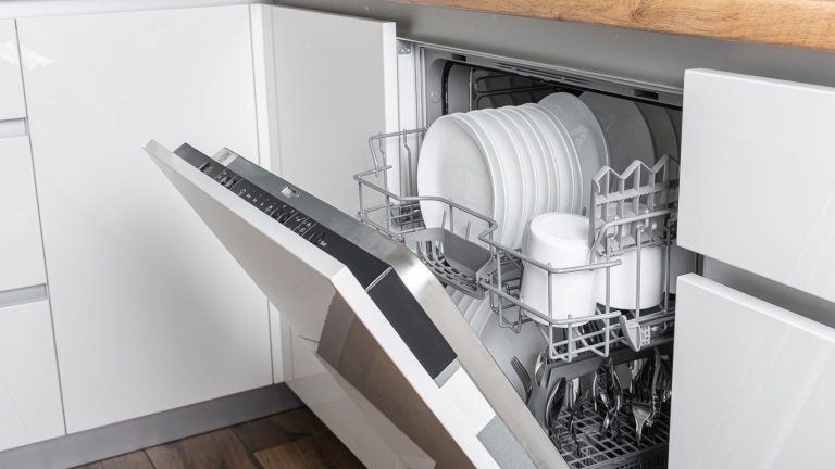 An opened dishwasher in the kitchen, How To Reset Jenn Air Dishwasher [Quickly & Easily] - 1600x900