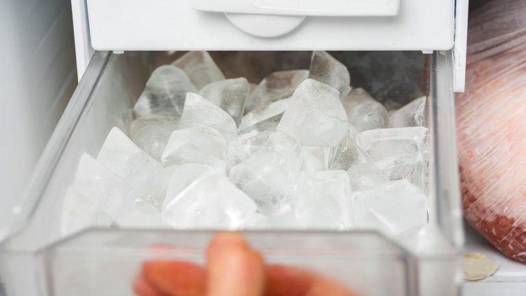 Getting ice from the ice maker, How To Reset A Beko Ice Maker [Quickly & Easily] - 1600x900