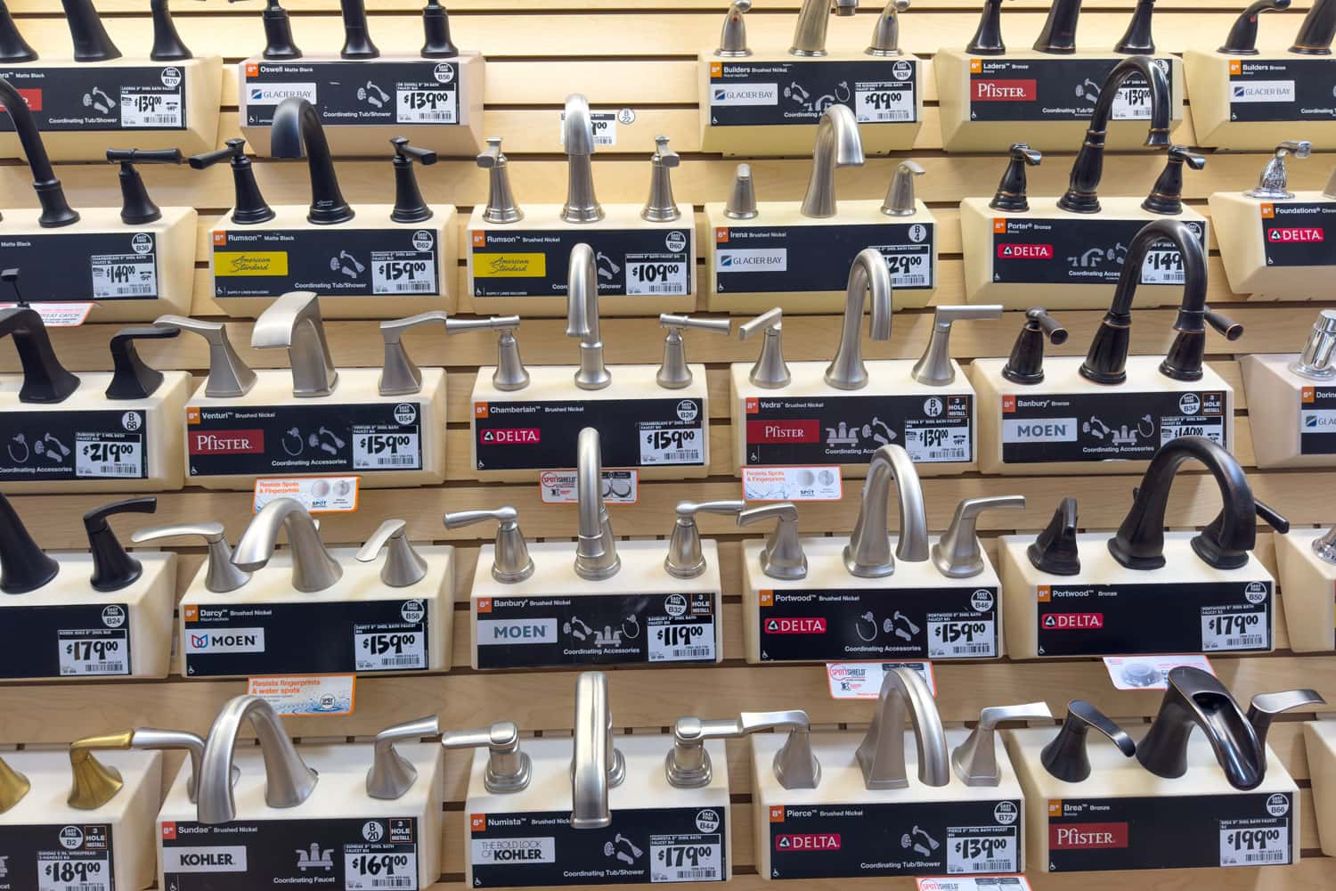 A whole store rack filled with Delta faucets